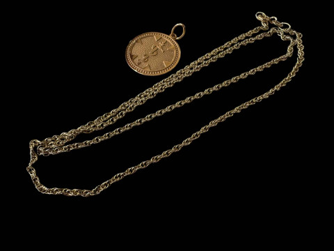 9 carat gold chain with 14k gold pendant.