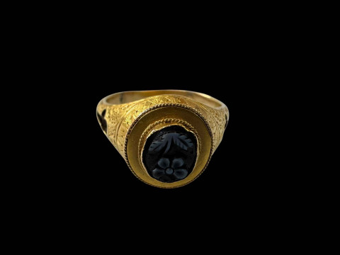 19th Century gold mourning ring with cameo and hair strands, size R.
