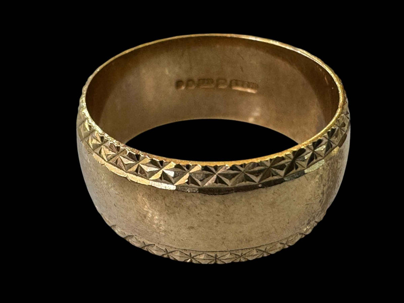 9 carat gold wedding band.