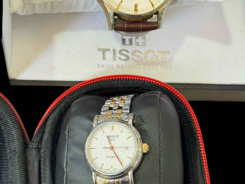 Ladies and Gents Tissot wristwatches.