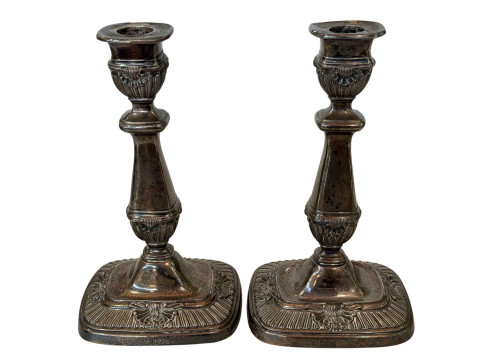 Pair Edwardian silver loaded candlesticks with shell and gadroon borders,...