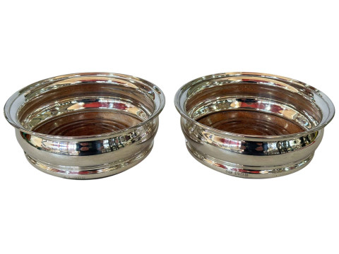 Pair silver wine bottle coasters, London 1963.