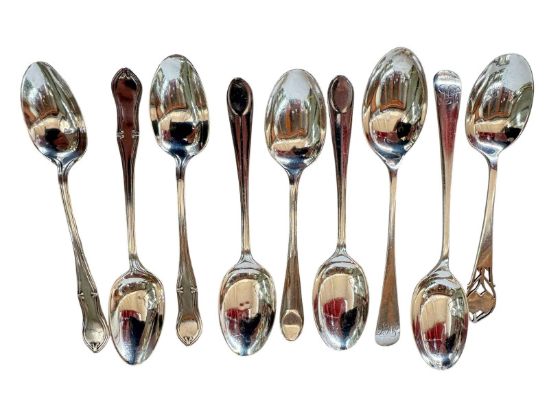 Collection of nine silver teaspoons.