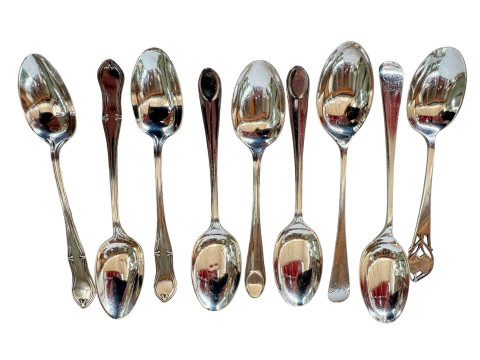 Collection of nine silver teaspoons.