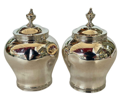 Pair of silver baluster caddies with covers, 11cm, marks rubbed.