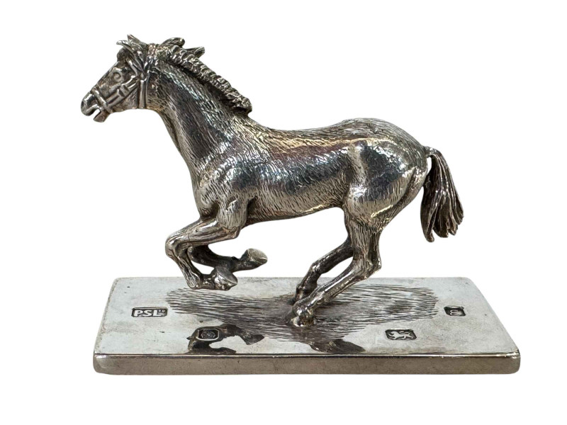 Parkin Silversmiths model of galloping horse on rectangular base, 6.5cm high, base 9cm across, hallmarked for Sheffield 1979.