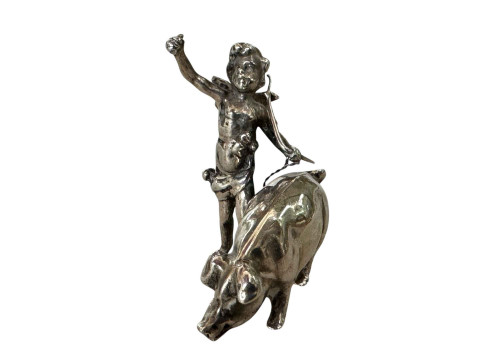 Silver model of winged putti with pig, Chester hallmark for 1900, 4.25cm...