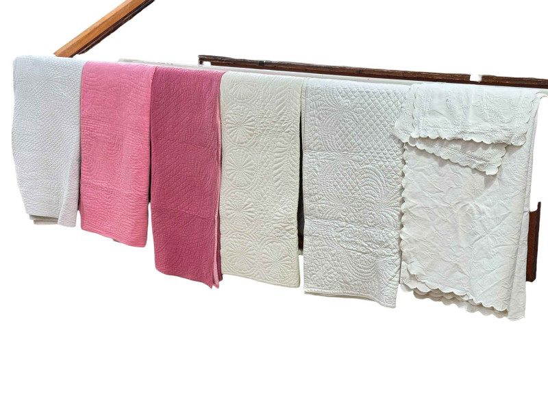 Five assorted quilts, bed cover and two matching cushion covers.
