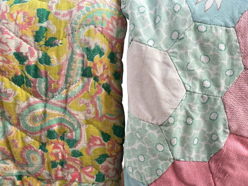 Four assorted quilts including patchwork.