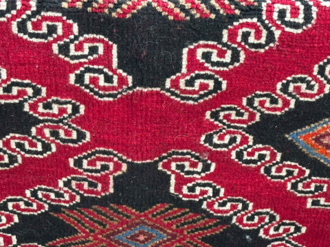 Red ground hand knotted Persian Baloochi rug, 204cm by 125cm. thumbnail