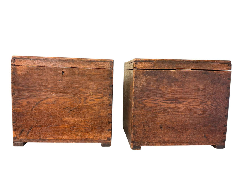 Two oak strongboxes and three metal deed boxes.