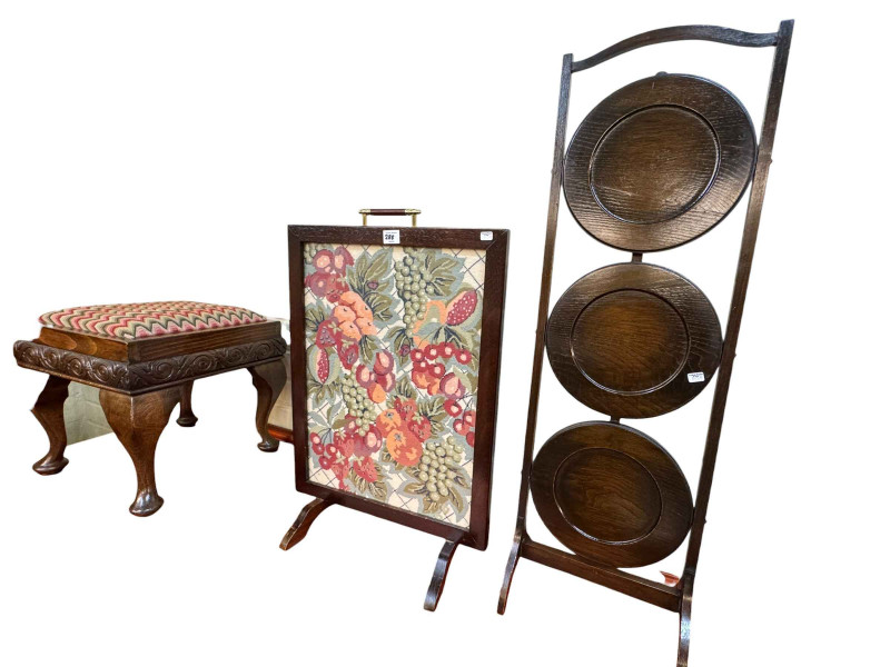 Victorian ebonised nursing chair, a mahogany drop leaf Sutherland table, small stool, cake stand and a firescreen.