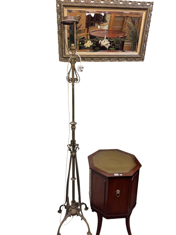 Victorian brass standing oil lamp converted to electric, mahogany leather topped cellarette and a painted mirror.