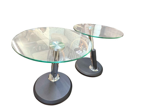 Pair of contemporary glass topped circular coffee tables.