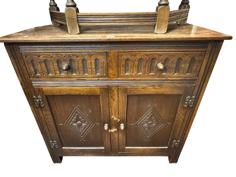 Carved oak buffet sideboard and small two door oak sideboard.