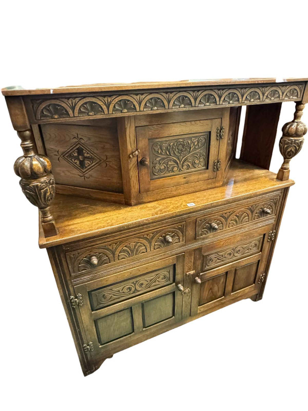 Carved oak buffet sideboard and small two door oak sideboard.