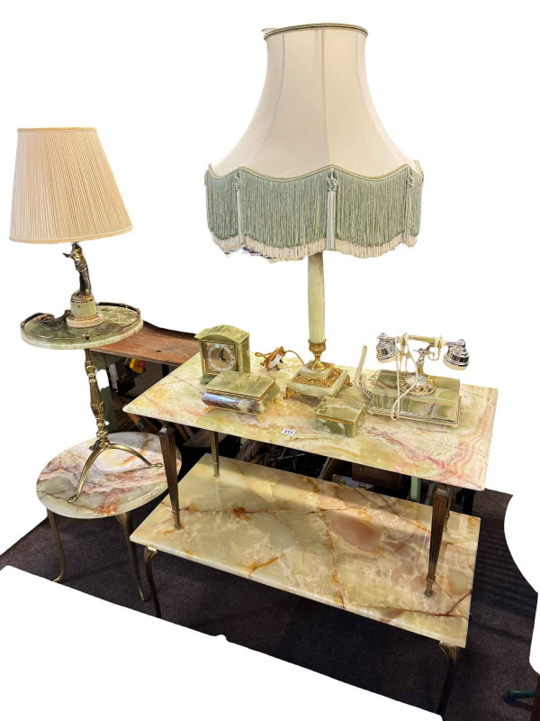 Two rectangular onyx coffee tables, two circular wine tables, two table lamps, clock, telephone and two trinket boxes.