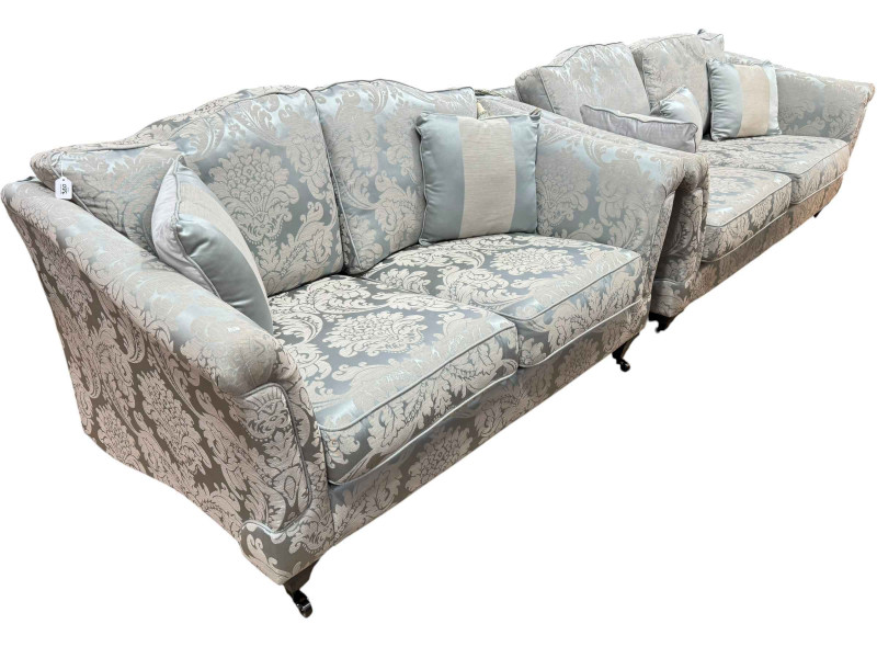 Two Knoll style settees and easy chair in brocade upholstery with cushions.