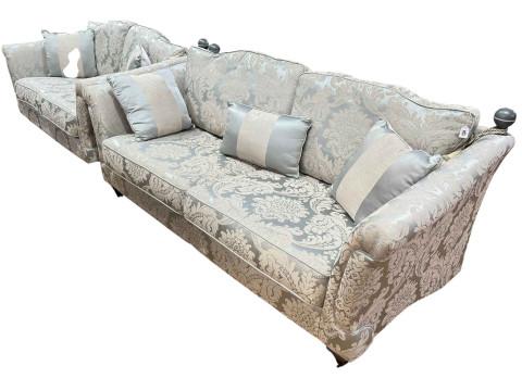 Two Knoll style settees and easy chair in brocade upholstery with cushions.