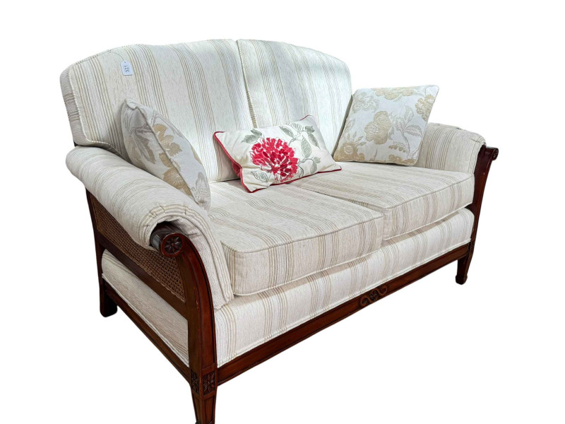 Mahogany framed bergere two seat sofa.