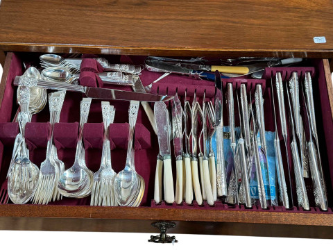 Walnut three drawer pedestal with cutlery. thumbnail