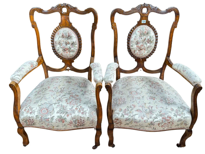 Pair Victorian walnut framed armchairs.