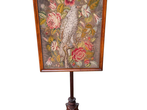 Victorian needlework pole screen on tripod base.