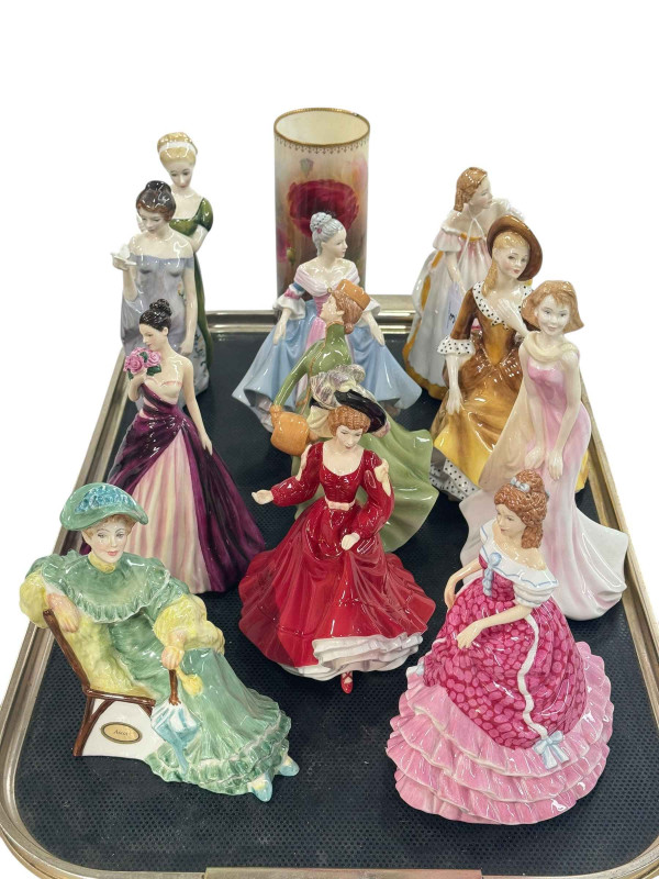 Eleven Royal Doulton figures and poppy sleeve vase (12).