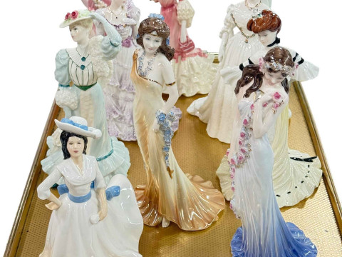 Nine Coalport limited edition figures and one Royal Doulton figure (10).