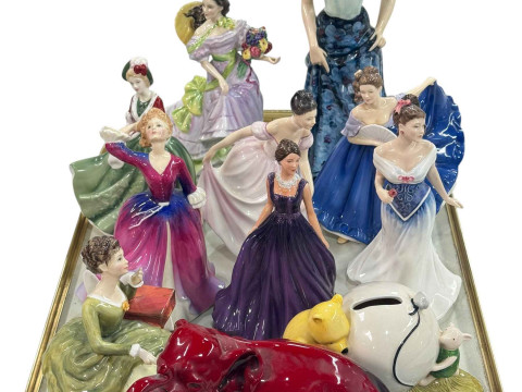 Ten Royal Doulton figures, Winnie the Pooh money box, and Flambé Elephant...