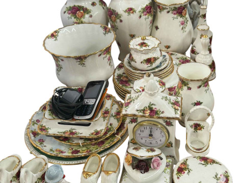 Royal Albert Old Country Roses including vases etc, over thirty pieces.