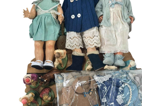 Three vintage dolls, dolls clothing and nativity set.