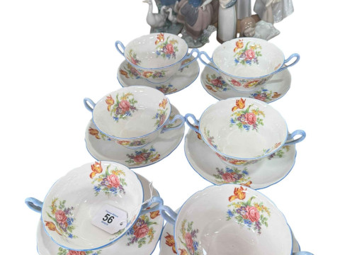 Six Shelley soup bowls and saucers, four Lladro and three Nao figures.