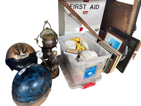 First Aid cabinet, two motorcycle helmets, BSA sign, pictures, spirit...
