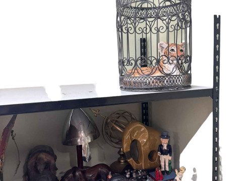 Four novelty money boxes, ornaments, replica Viking helmet and ornamental...