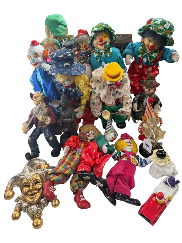 Collection of clown figures, jester plaque, etc.