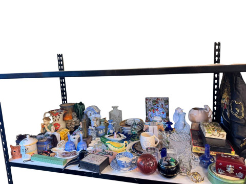 Collection of glass and china including Sylvac vases, two soapstone carvings,...