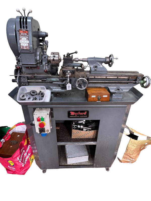 Myford metal turning lathe with stand and accessories.