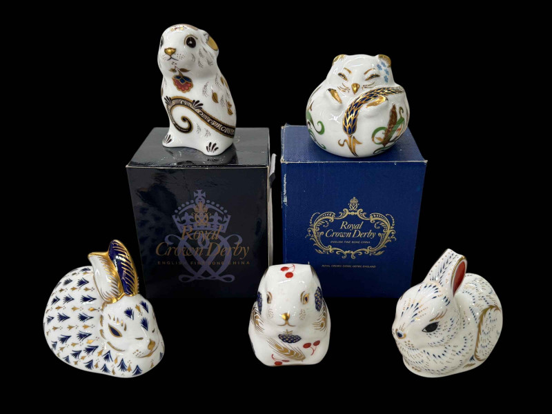 Five Royal Crown Derby paperweights, Door Mouse and Mouse with boxes, and two rabbits and mouse.