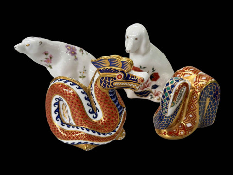 Four Royal Crown Derby paperweights, Snake, Dragon, Polar Bear and Dog.