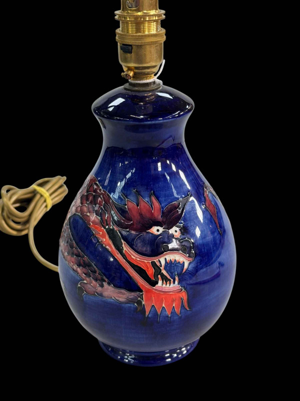 Moorcroft Pottery 'Dragon' table lamp, 20cm to top of pottery, with blue shade.