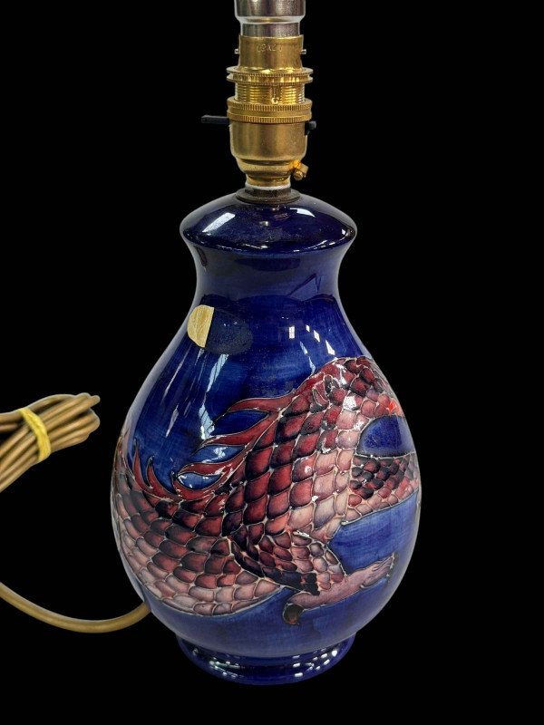 Moorcroft Pottery 'Dragon' table lamp, 20cm to top of pottery, with blue shade.