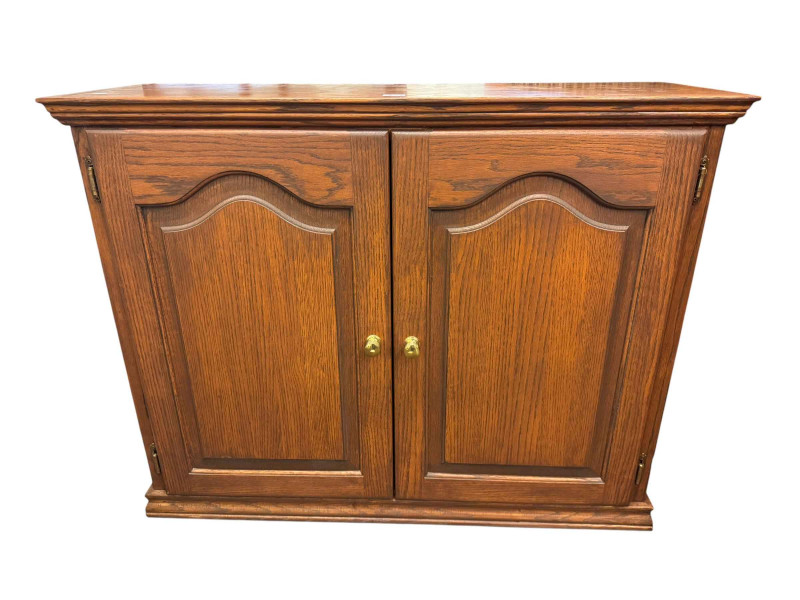 Oak cabinet having a double cupboard beside four small drawers above three long drawers on bracket feet and small two door cupboard (large cabinet 97cm by 171cm by 44cm).