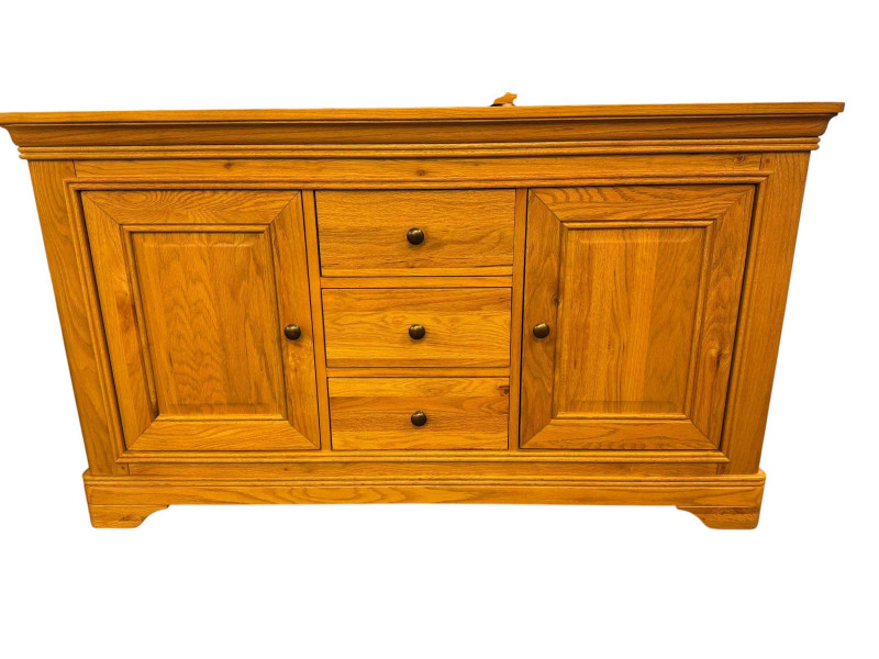 Light oak sideboard having three central drawers flanked by two cupboard, 151cm by 86cm by 48cm, and small two door pedestal.