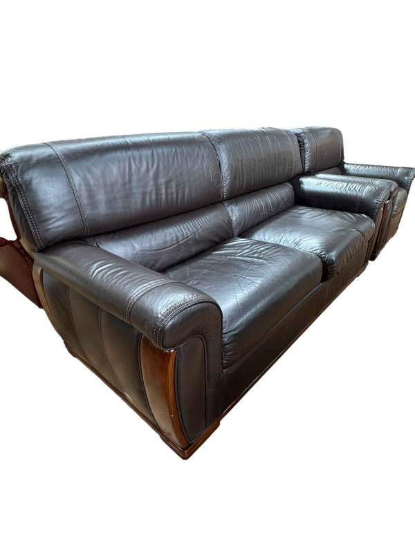 Ferrari leather and mahogany three seater settee and chair.