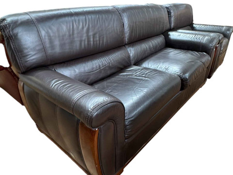 Ferrari leather and mahogany three seater settee and chair.