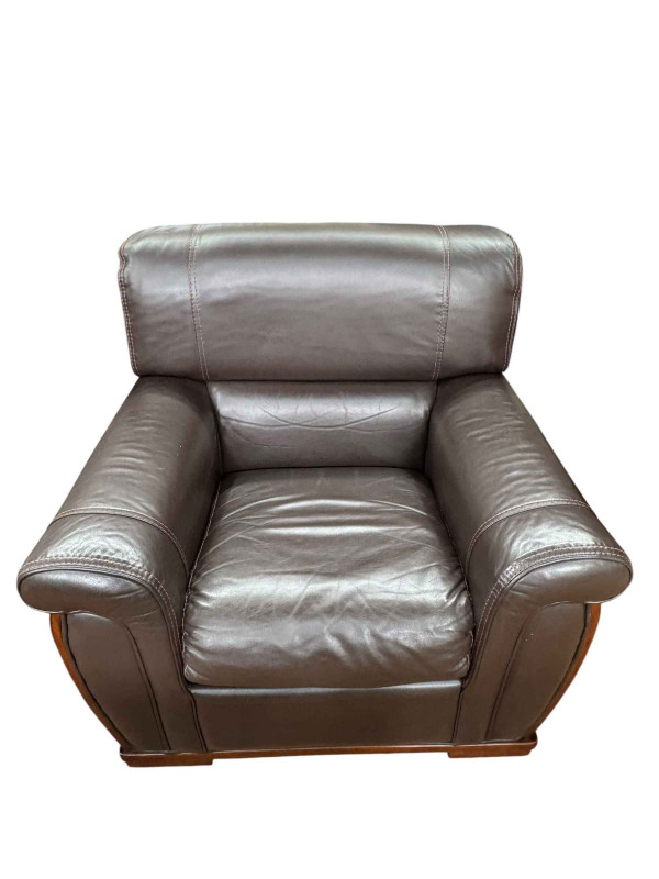 Ferrari leather and mahogany three seater settee and chair.