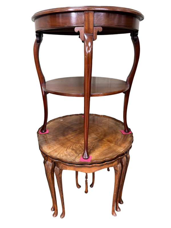 Walnut three drawer pedestal with cutlery, walnut circular nest of five table and mahogany circular two tier occasional table.