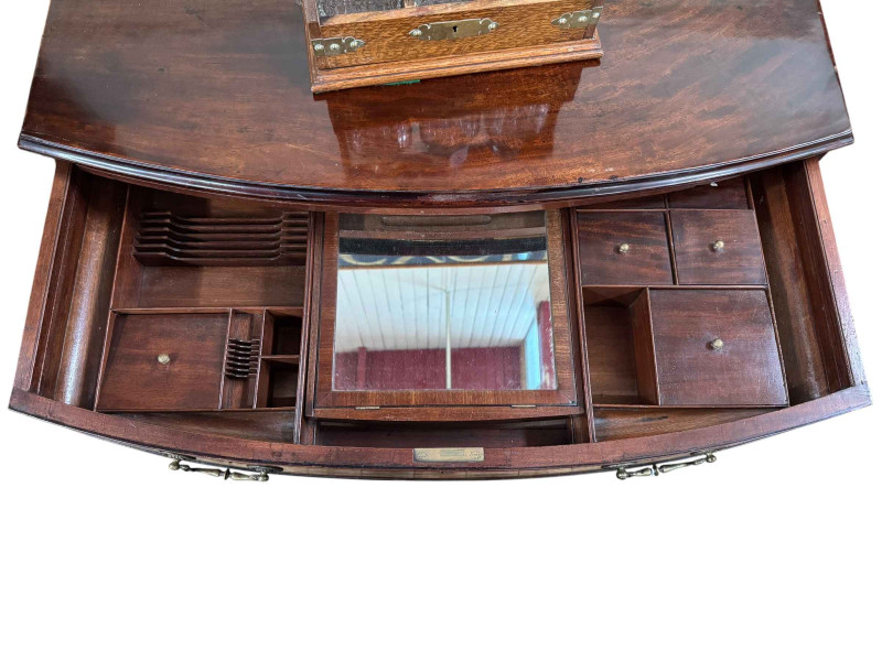 19th Century mahogany bowfront kneehole Gentleman's dressing chest with well fitted frieze drawer, 94cm by 58cm by 76cm.