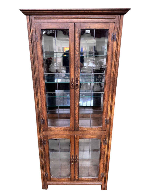 Oak leaded glass door bookcase, 178cm by 80cm by 37cm.